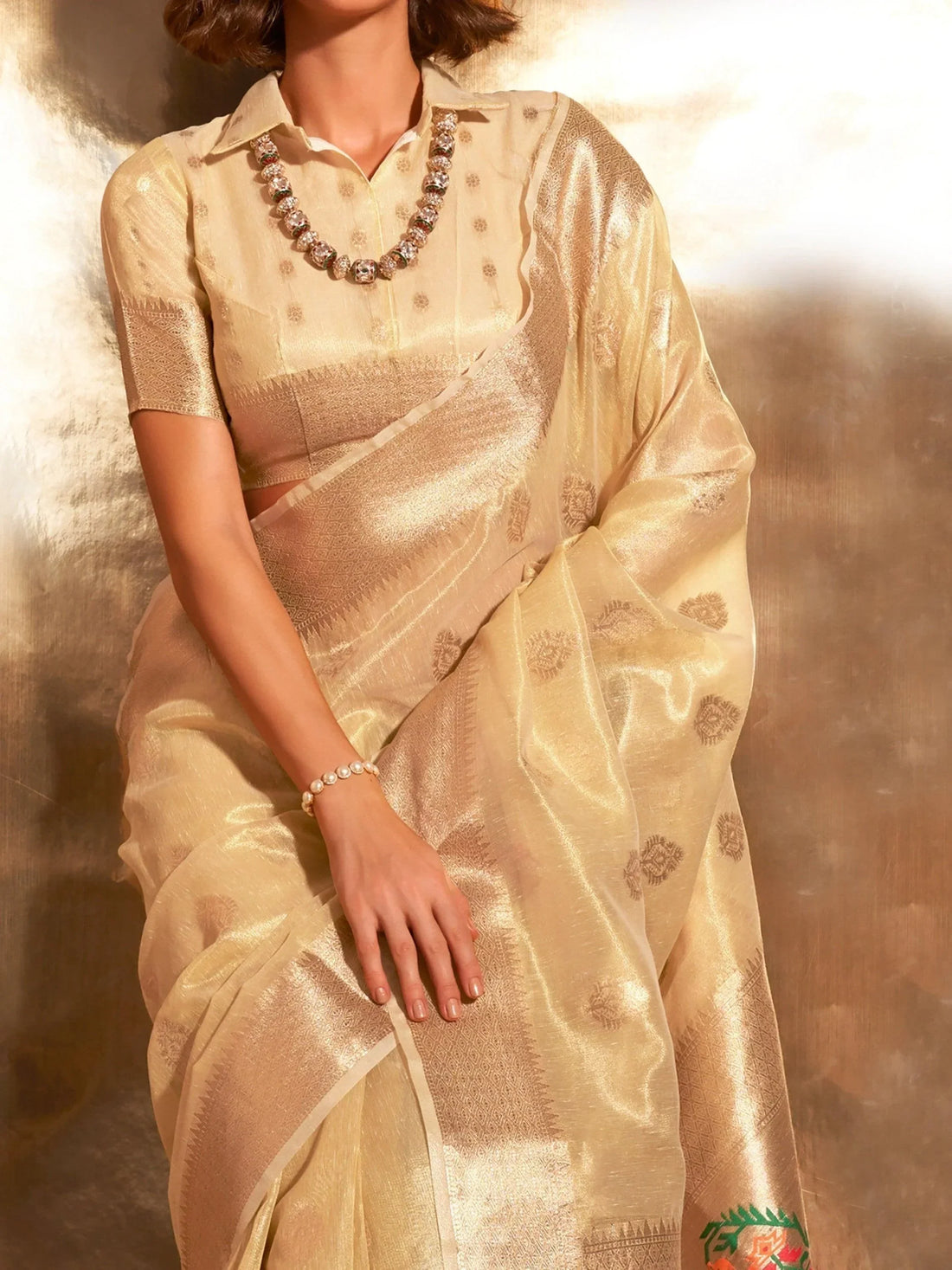 Charming Golden Handwoven Tissue Silk Party Wear Saree