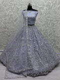 Charming Ice Blue Sequins Work Net Engagement Wear Lehenga Choli With Dupatta - Zeel Clothing