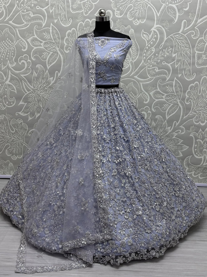 Charming Ice Blue Sequins Work Net Engagement Wear Lehenga Choli With Dupatta - Zeel Clothing