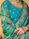 Teal embroidered saree with gold detailing, traditional Indian women's fashion