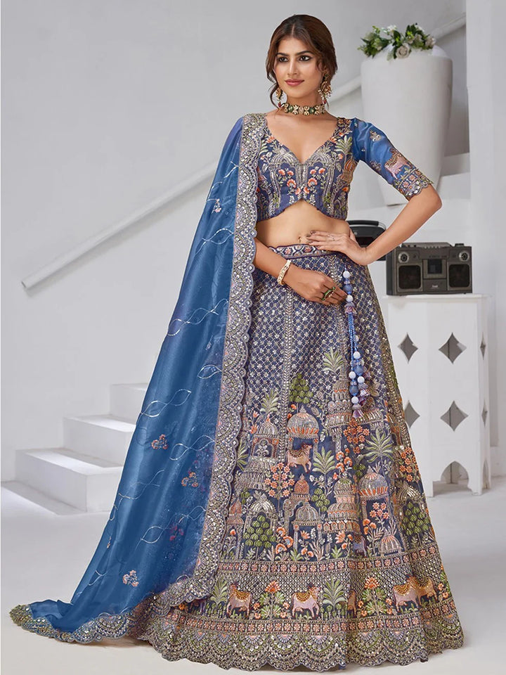 Charming Navy Blue Zari Embroidered Organza Engagement Wear Lehenga Choli