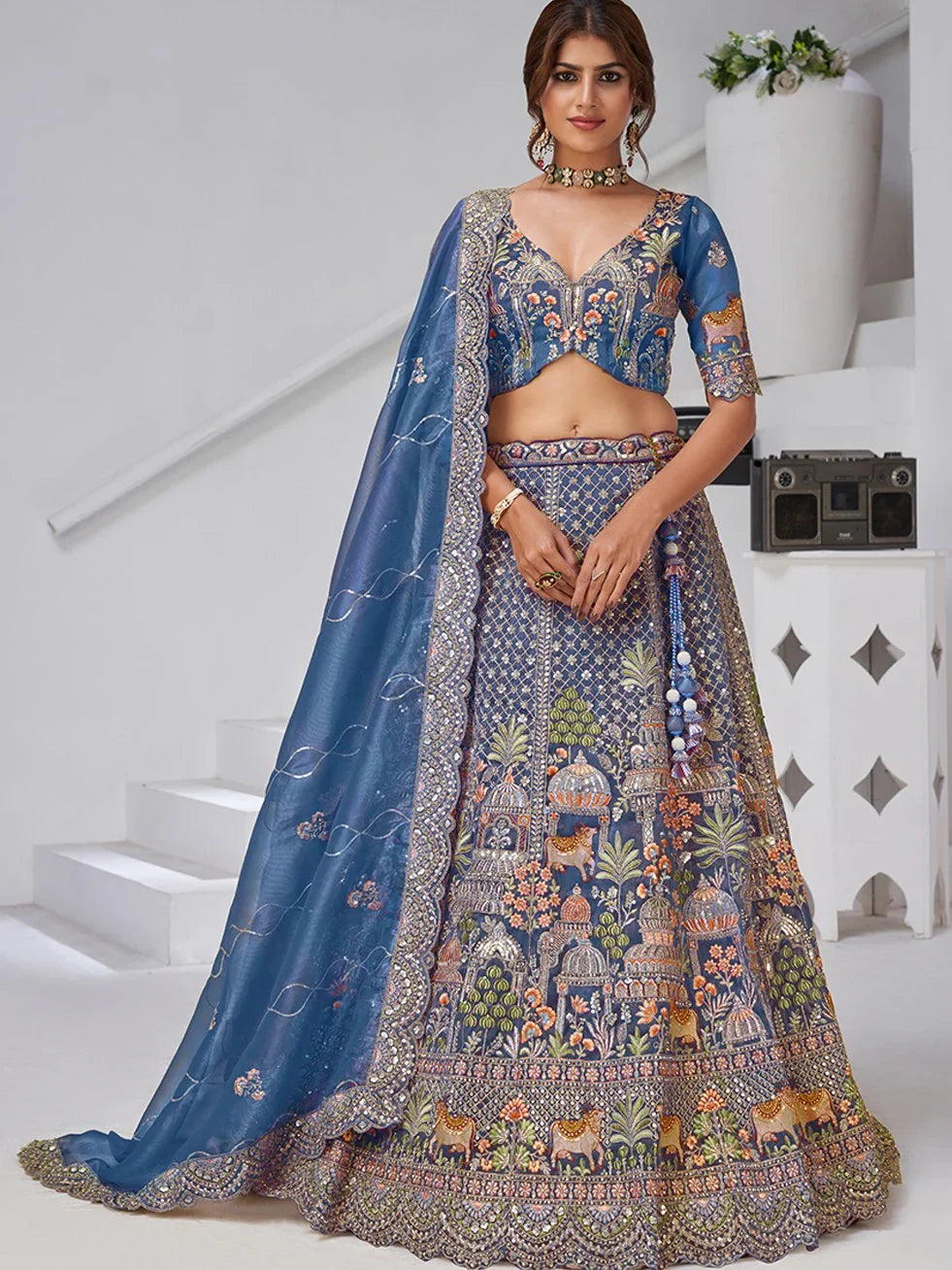 Charming Navy Blue Zari Embroidered Organza Engagement Wear Lehenga Choli