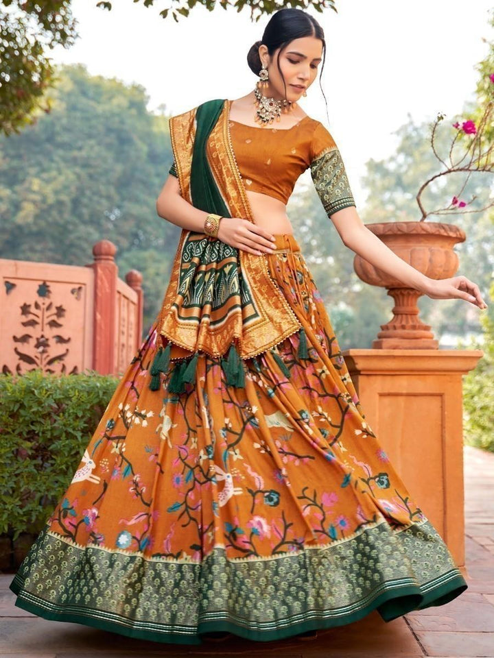 Charming Orange Foil Printed Silk Festive Wear Lehenga Choli With Dupatta