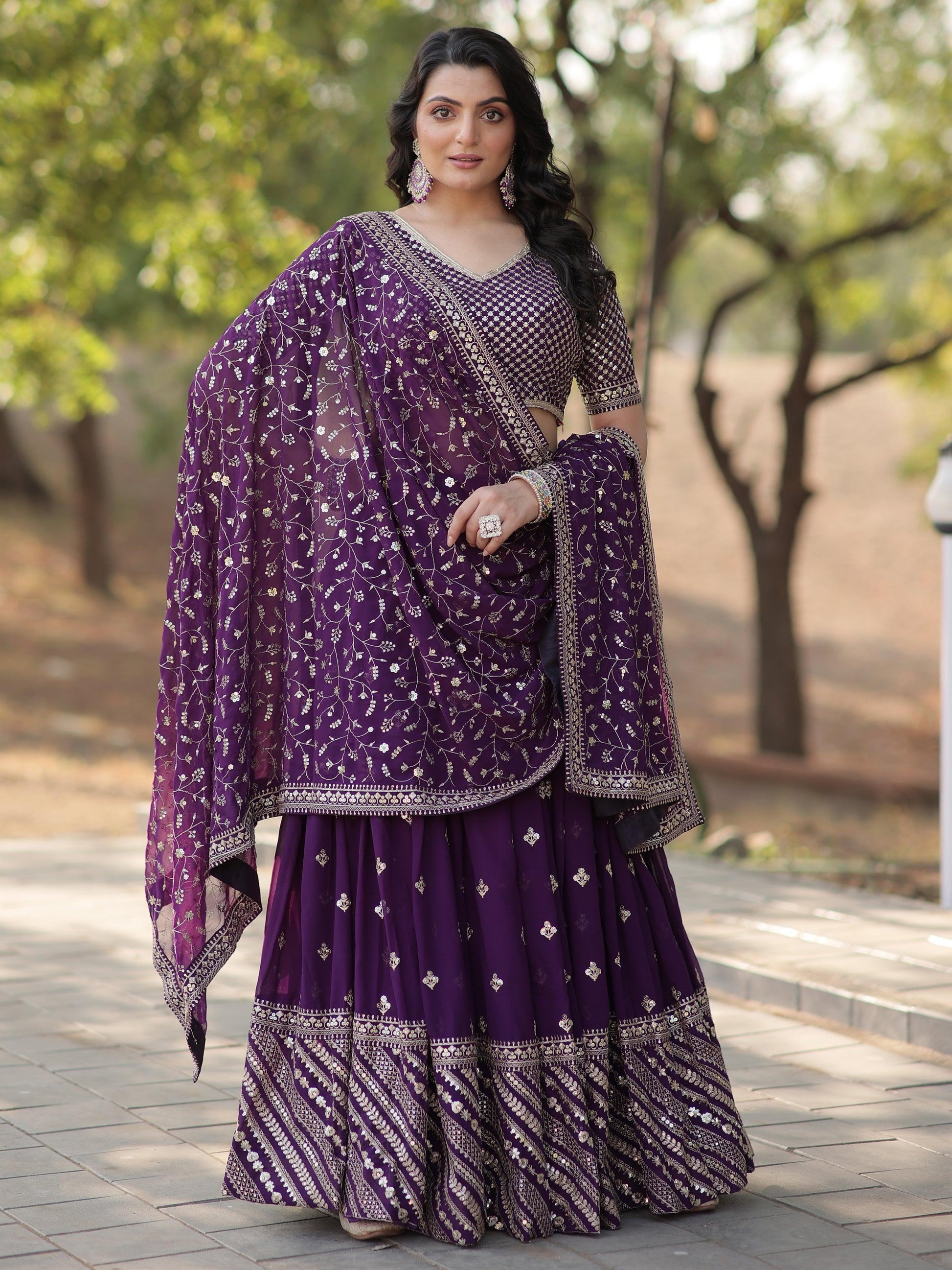 Charming Purple Embroidered Georgette Wedding Lehenga Choli