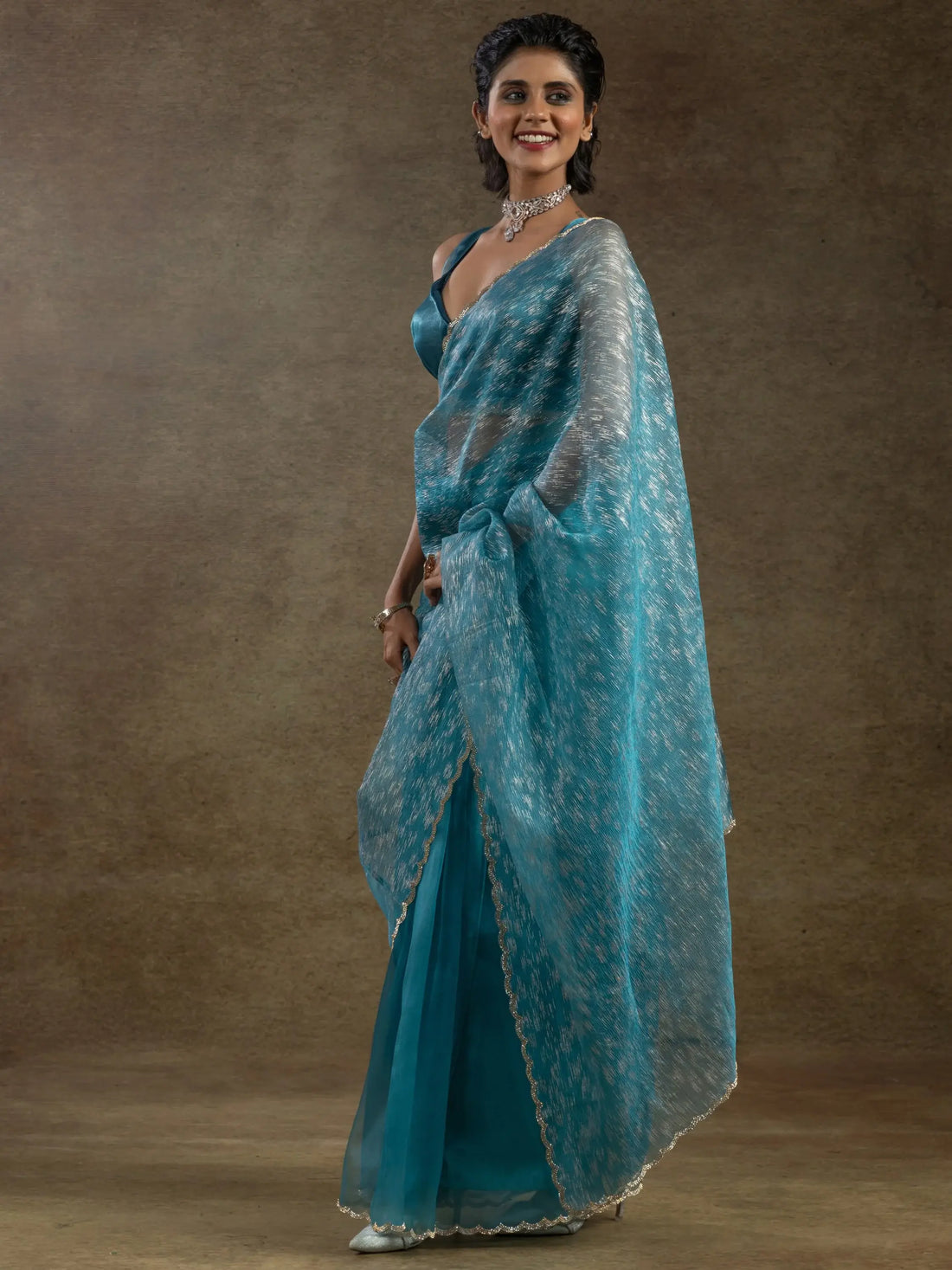 Charming Teal Blue Zari Weaving Organza Reception Wear Pre-Stitched Saree - Zeel Clothing