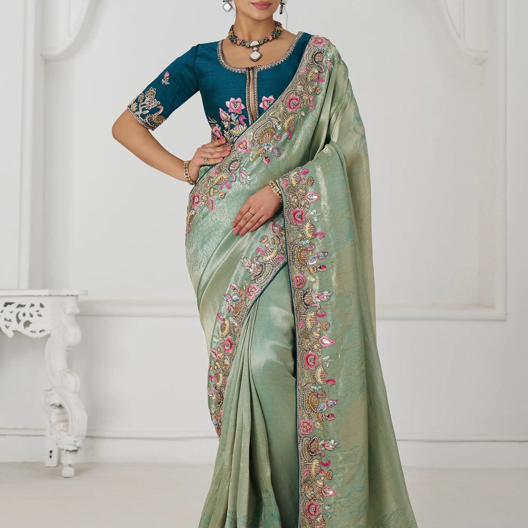 Charming Teal Green Border Work Dola Silk Engagement Wear Saree - Zeel Clothing