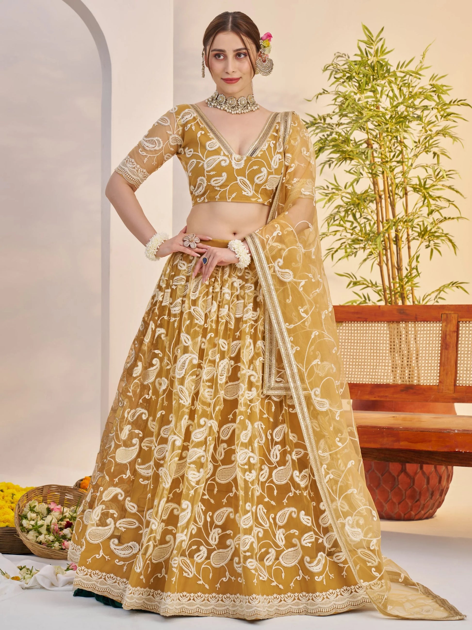 Charming Yellow Embroidered Net Haldi Wear Lehenga Choli With Dupatta