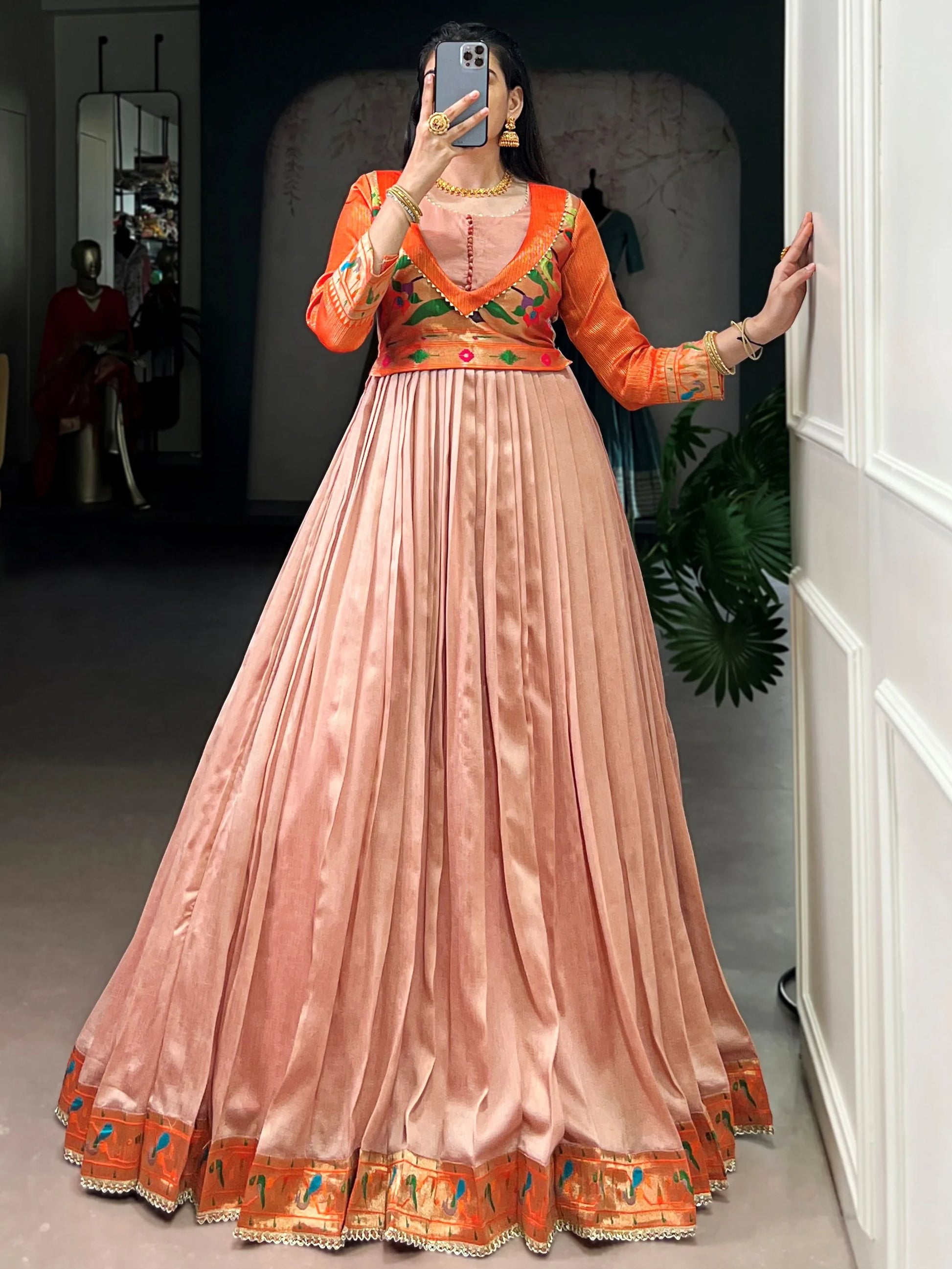 Classy Peach Zari Weaving  Silk Engagement Wear Gown