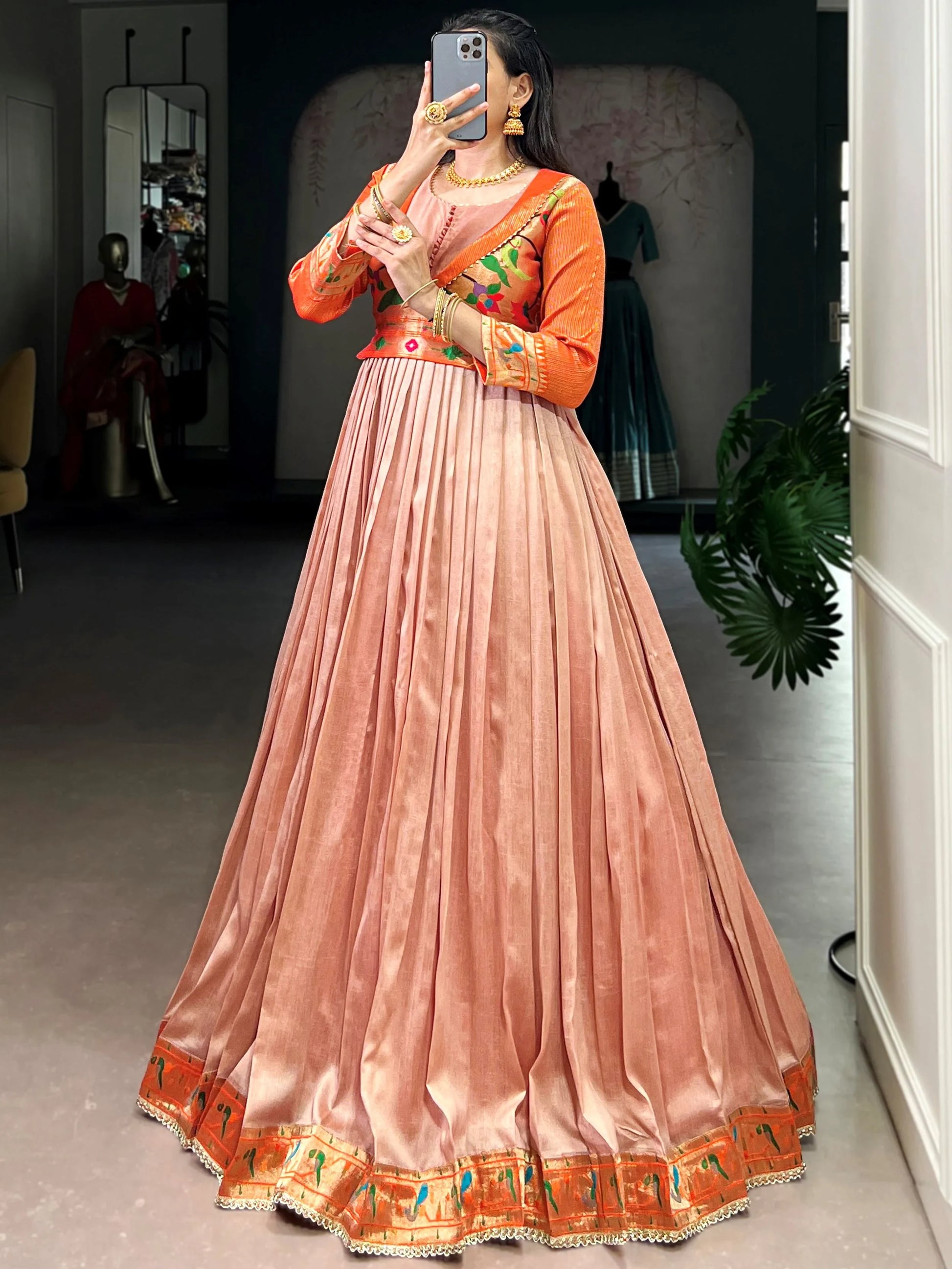 Classy Peach Zari Weaving  Silk Engagement Wear Gown