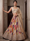 Glamorous Cream Embroidered Tissue Wedding Wear Lehenga Choli With Dupatta