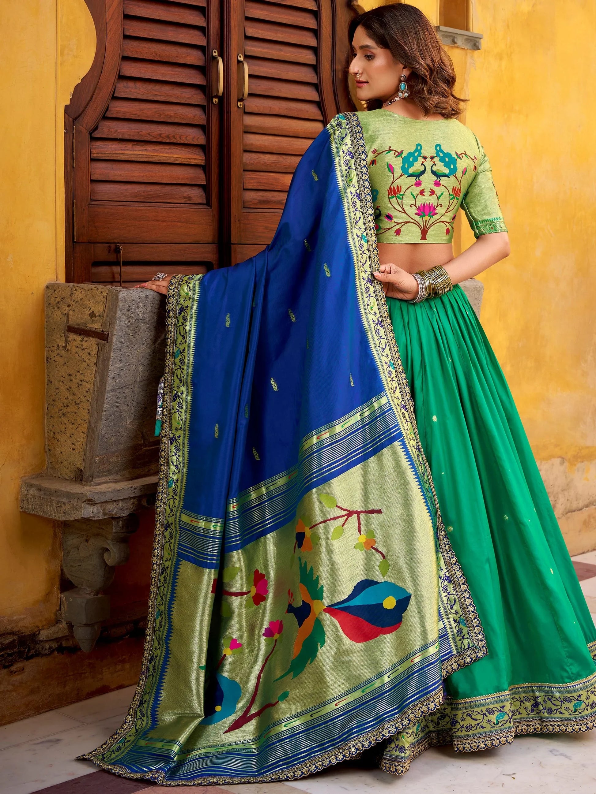 Dazzling Green Zari Weaving Silk  Engagement Wear Lehenga With Dupatta