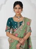 Dazzling Pista Green Border Work Dola Silk Wedding Wear Saree - Zeel Clothing