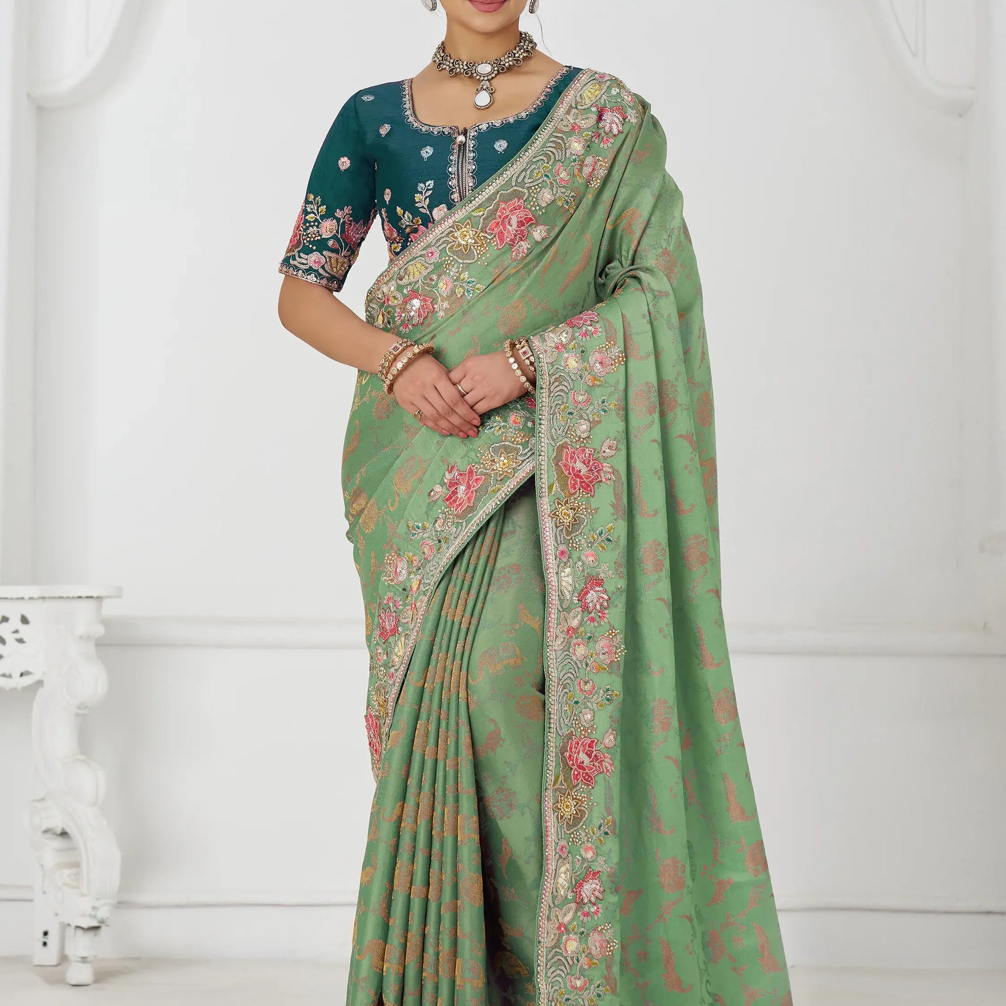 Dazzling Pista Green Border Work Dola Silk Wedding Wear Saree - Zeel Clothing