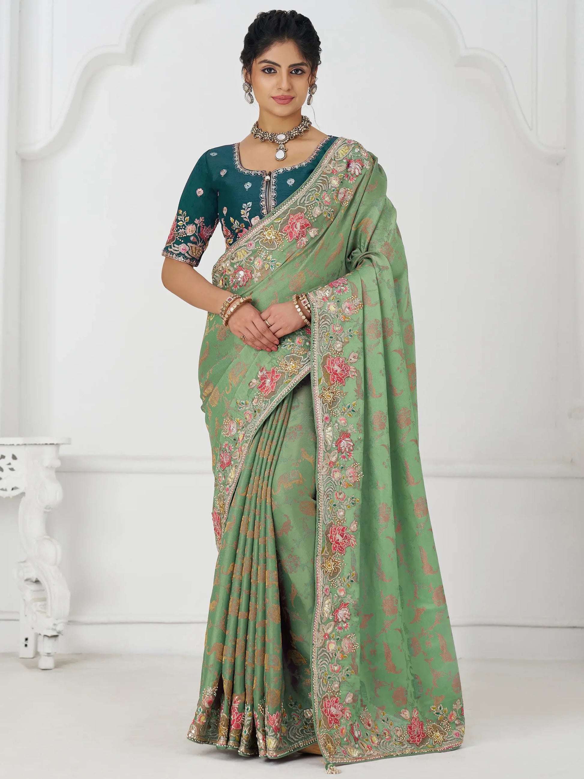 Dazzling Pista Green Border Work Dola Silk Wedding Wear Saree - Zeel Clothing
