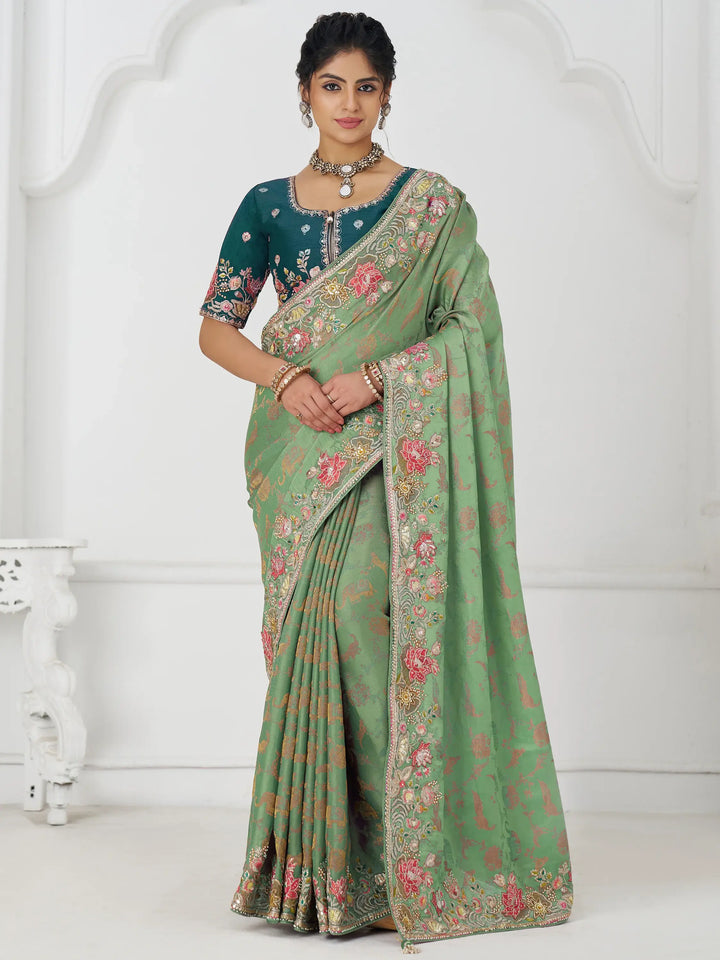 Dazzling Pista Green Border Work Dola Silk Wedding Wear Saree - Zeel Clothing