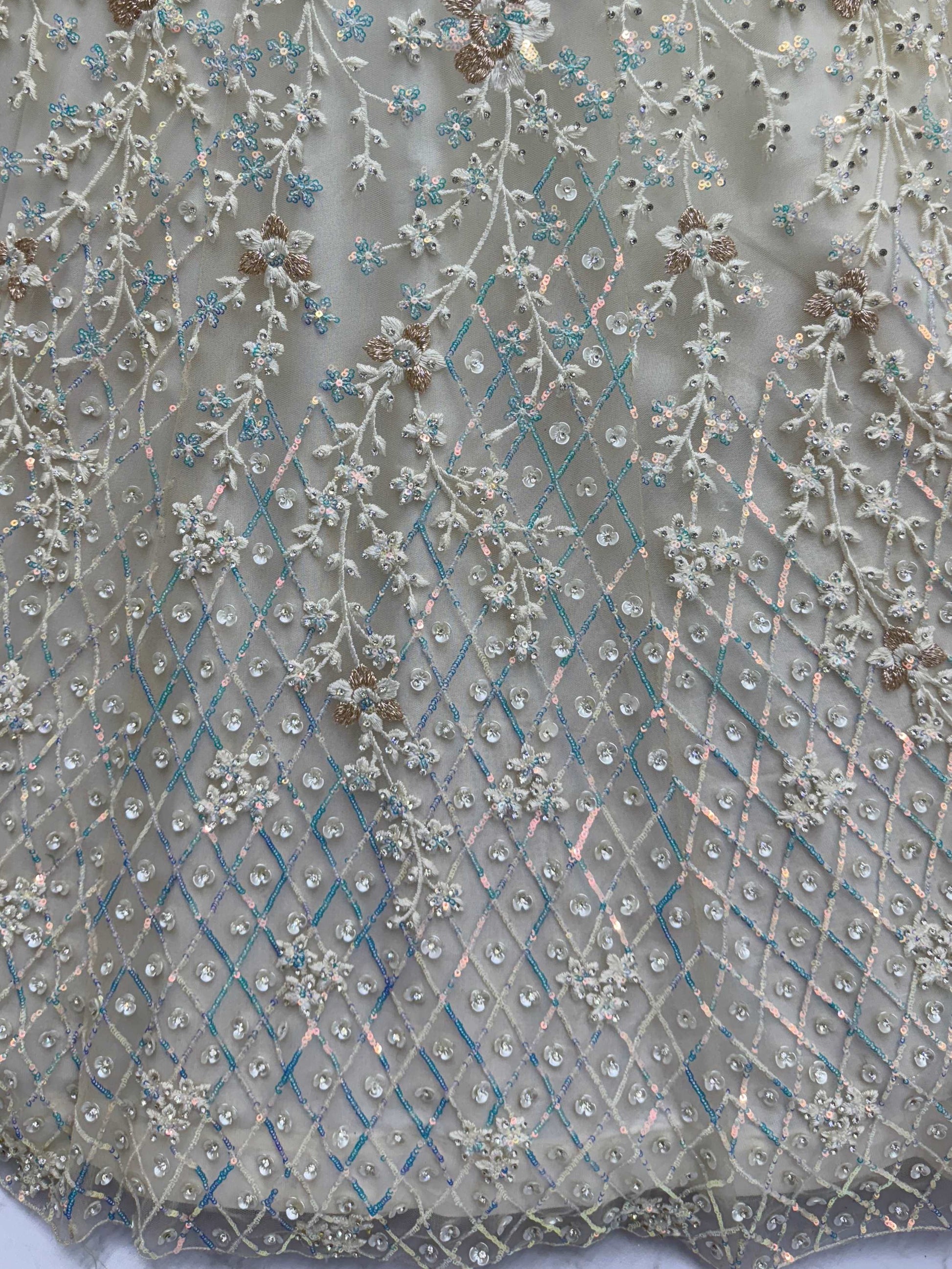 Dazzling Beige Zari Work Net Evening Wear Lehenga Choli With Dupatta