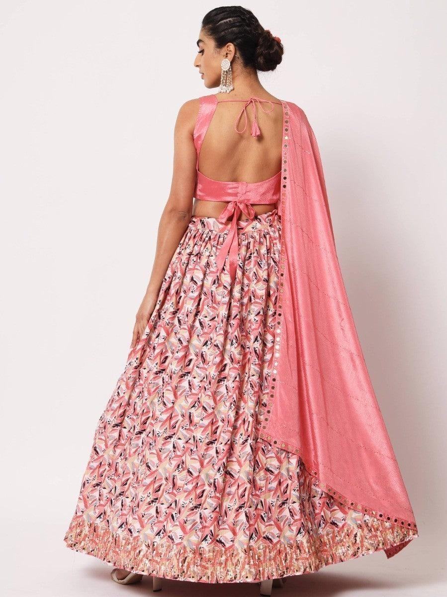 Pink printed lehenga with backless blouse and dupatta, stylish ethnic wear for women