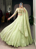 Elegant Tea Green Crush Silk Mehendi Wear Lehenga With Bead Work Choli