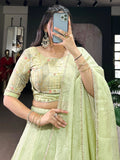 Elegant Tea Green Crush Silk Mehendi Wear Lehenga With Bead Work Choli