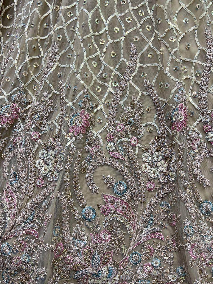 Enchanting Beige Multi Thread Work Net Reception Wear Lehenga Choli - Zeel Clothing