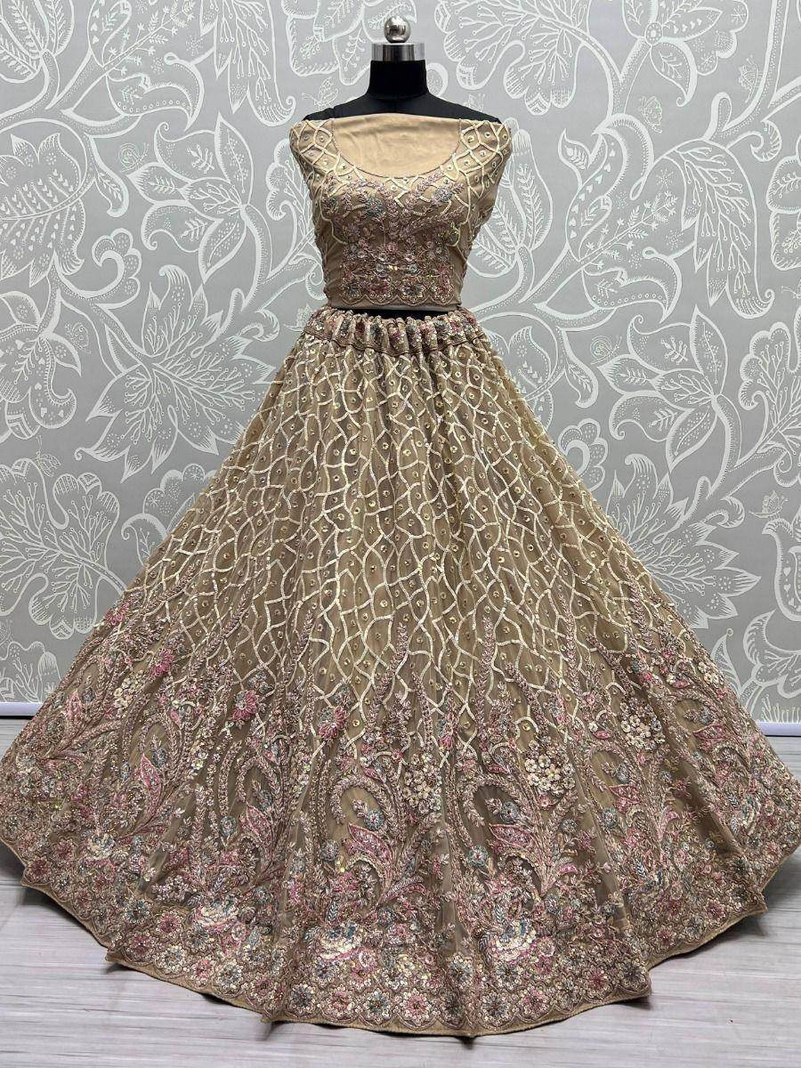 Enchanting Beige Multi Thread Work Net Reception Wear Lehenga Choli - Zeel Clothing