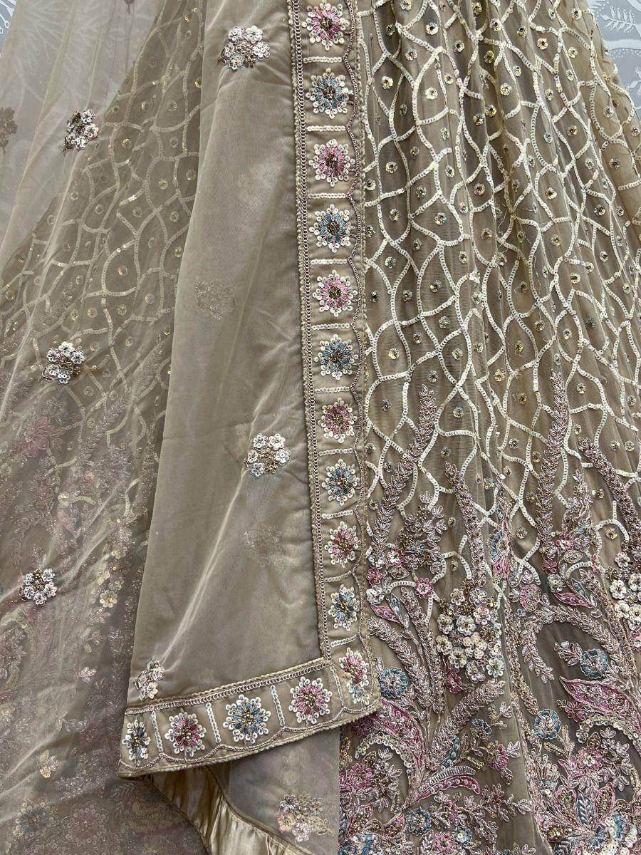 Enchanting Beige Multi Thread Work Net Reception Wear Lehenga Choli - Zeel Clothing