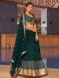 Enchanting Green Sequins Georgette Mehendi Wear Lehenga Choli