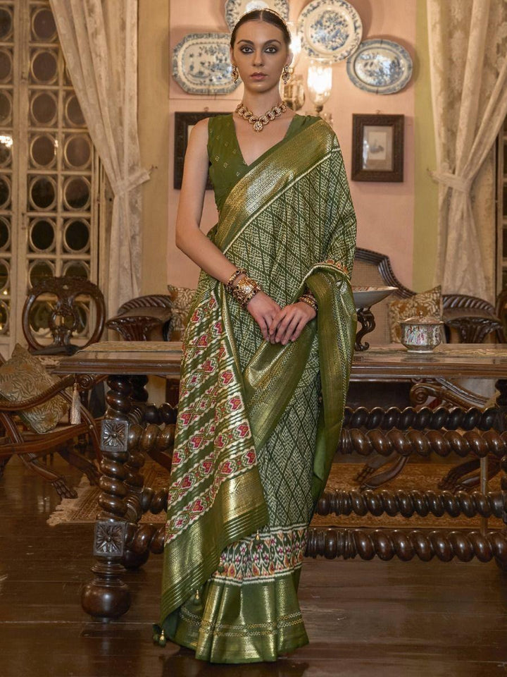 Enchanting Mehandi Green Printed Patola Silk Saree With Blouse