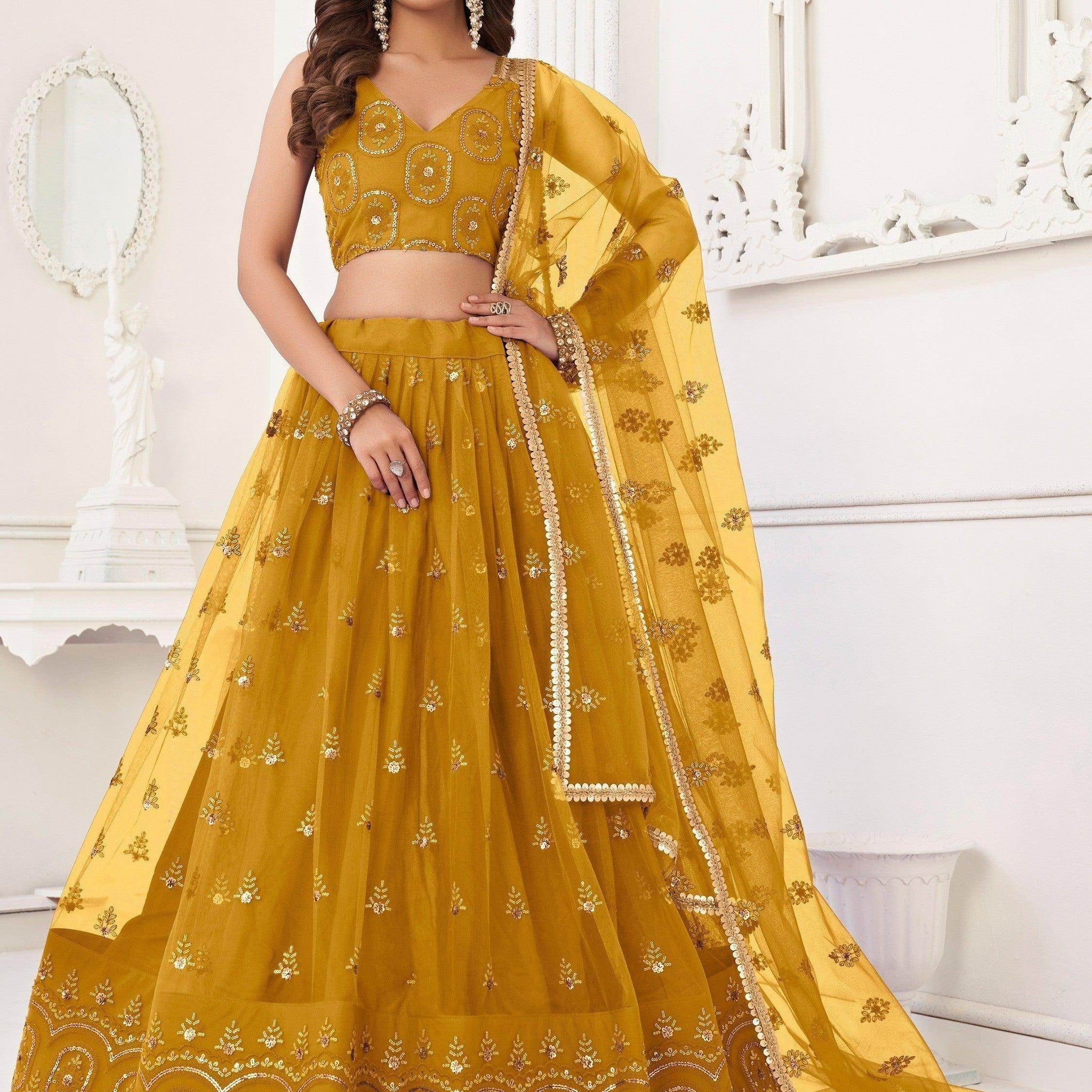 Enchanting Mustard Yellow Sequins Net Haldi Wear Lehenga Choli - Zeel Clothing