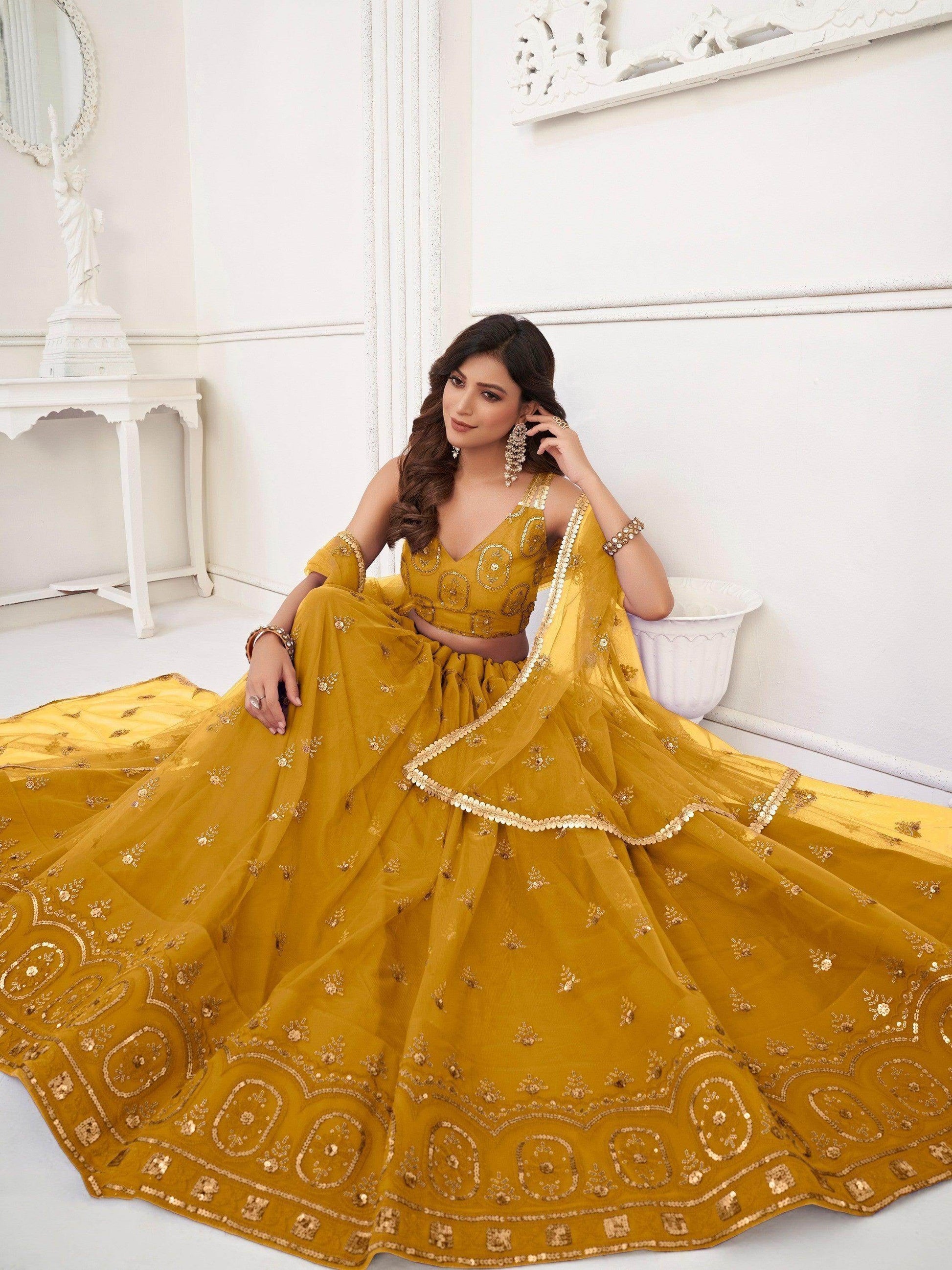 Enchanting Mustard Yellow Sequins Net Haldi Wear Lehenga Choli - Zeel Clothing