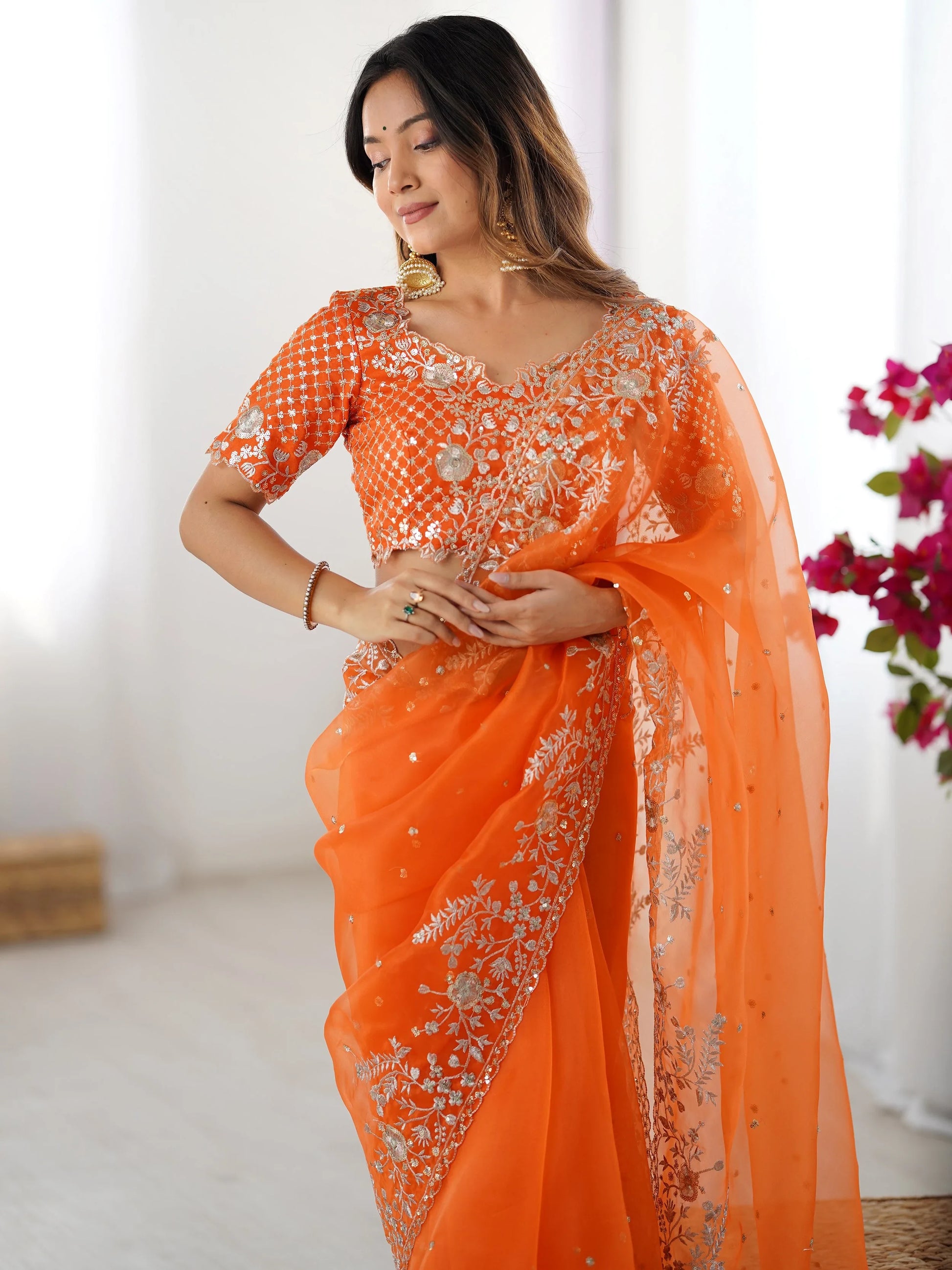 Enchanting Orange Sequins Organza Festive Wear Saree With Blouse