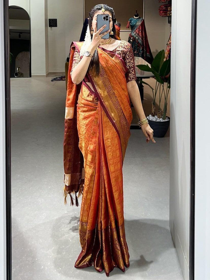 Enchanting Orange Zari Weaving Kanjivaram Saree With Blouse