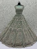 Enchanting Pista Green Sequins Net Reception Wear Lehenga Choli With Dupatta - Zeel Clothing