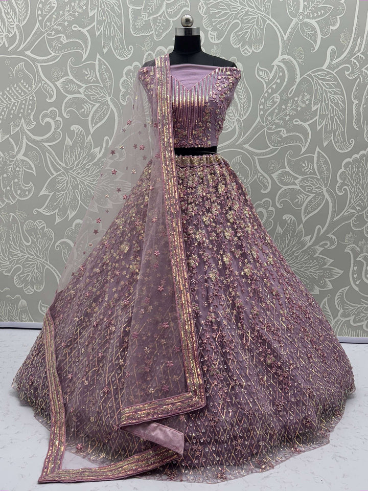 Excellent Mauve Zari Embroidery Net Reception Lehenga Choli With Dupatta