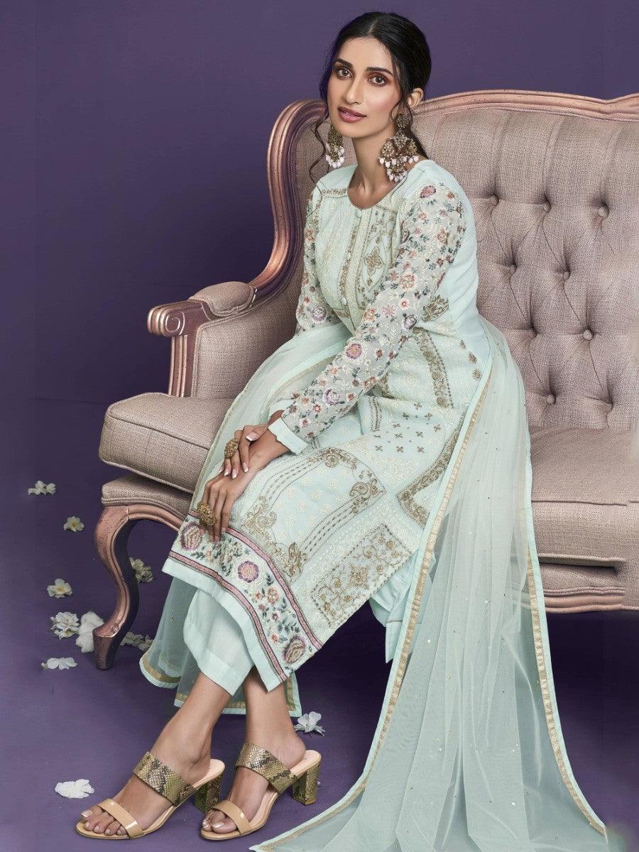 Elegant mint green embroidered kurta set with dupatta, styled for women's fashion