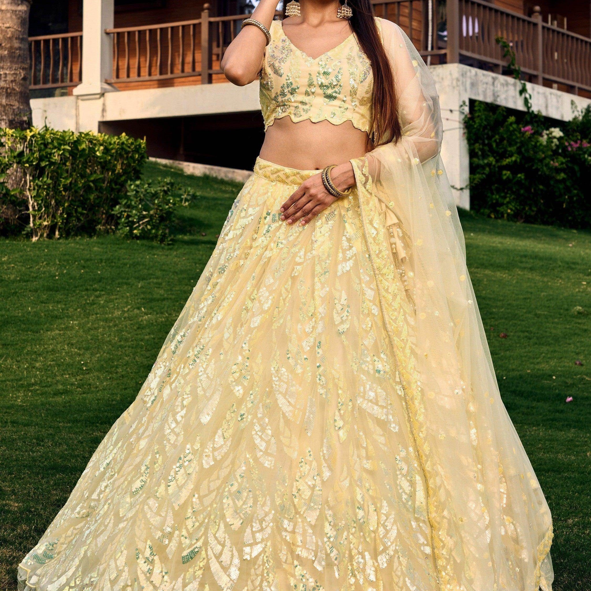 Excellent Yellow Sequins Net Haldi Wear Lehenga Choli With Dupatta - Zeel Clothing