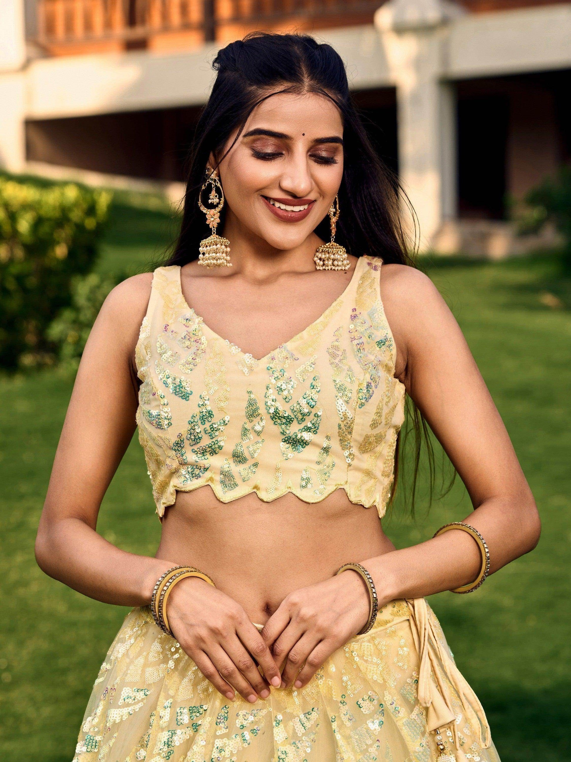 Excellent Yellow Sequins Net Haldi Wear Lehenga Choli With Dupatta - Zeel Clothing