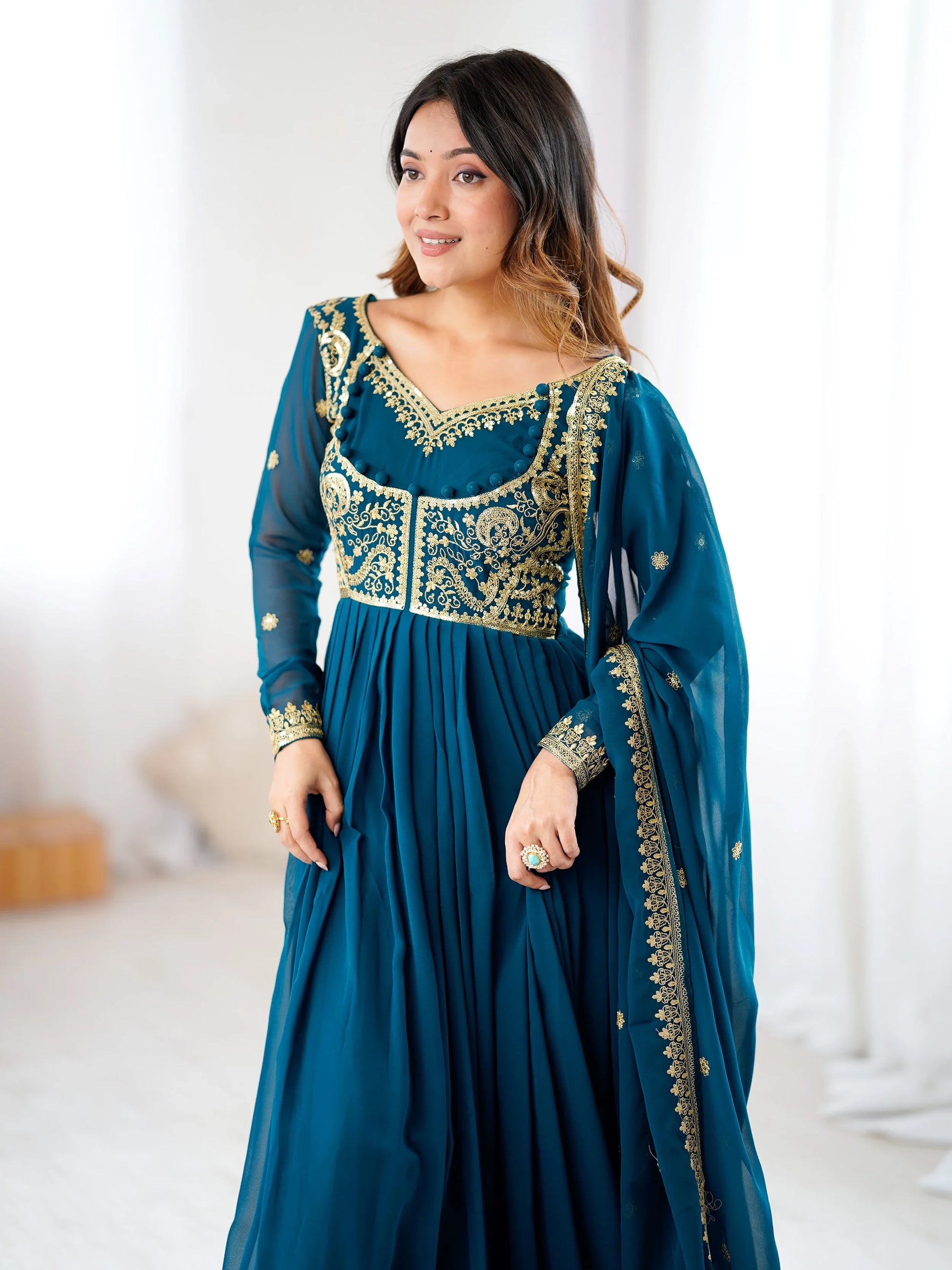 Exclusive Teal Blue Sequins Georgette Festive Wear Gown With Dupatta