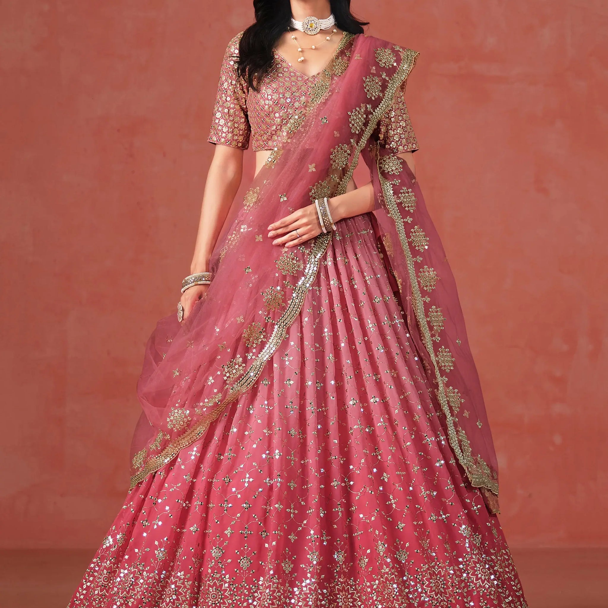 Fabulous Peach Georgette Embroidered Zari Lehenga Choli With Dupatta - Zeel Clothing