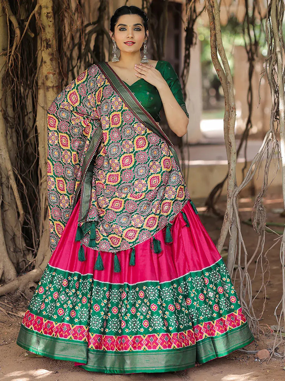 Fabulous Pink Green Patola Printed Silk Garba Wear Lehenga Choli - Zeel Clothing
