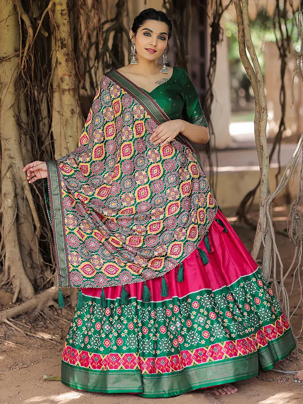 Fabulous Pink Green Patola Printed Silk Garba Wear Lehenga Choli - Zeel Clothing