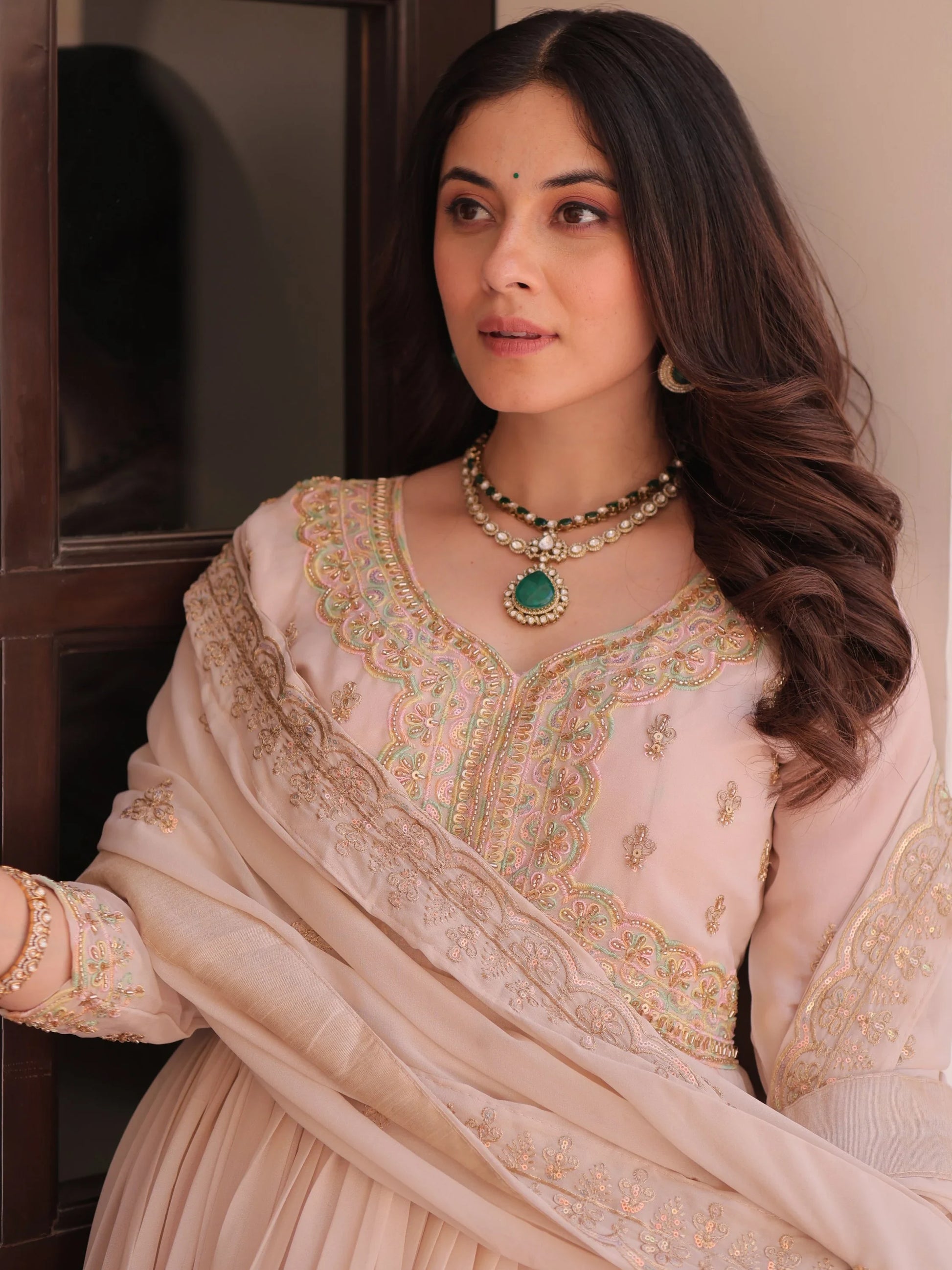 Fantabulous Cream Multi Thread Work Georgette Festive Wear Gown