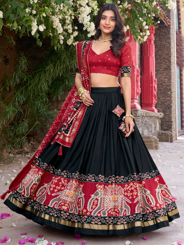 Fascinating Black Patola Printed Tussar Silk Lehenga Choli With Dupatta - Zeel Clothing