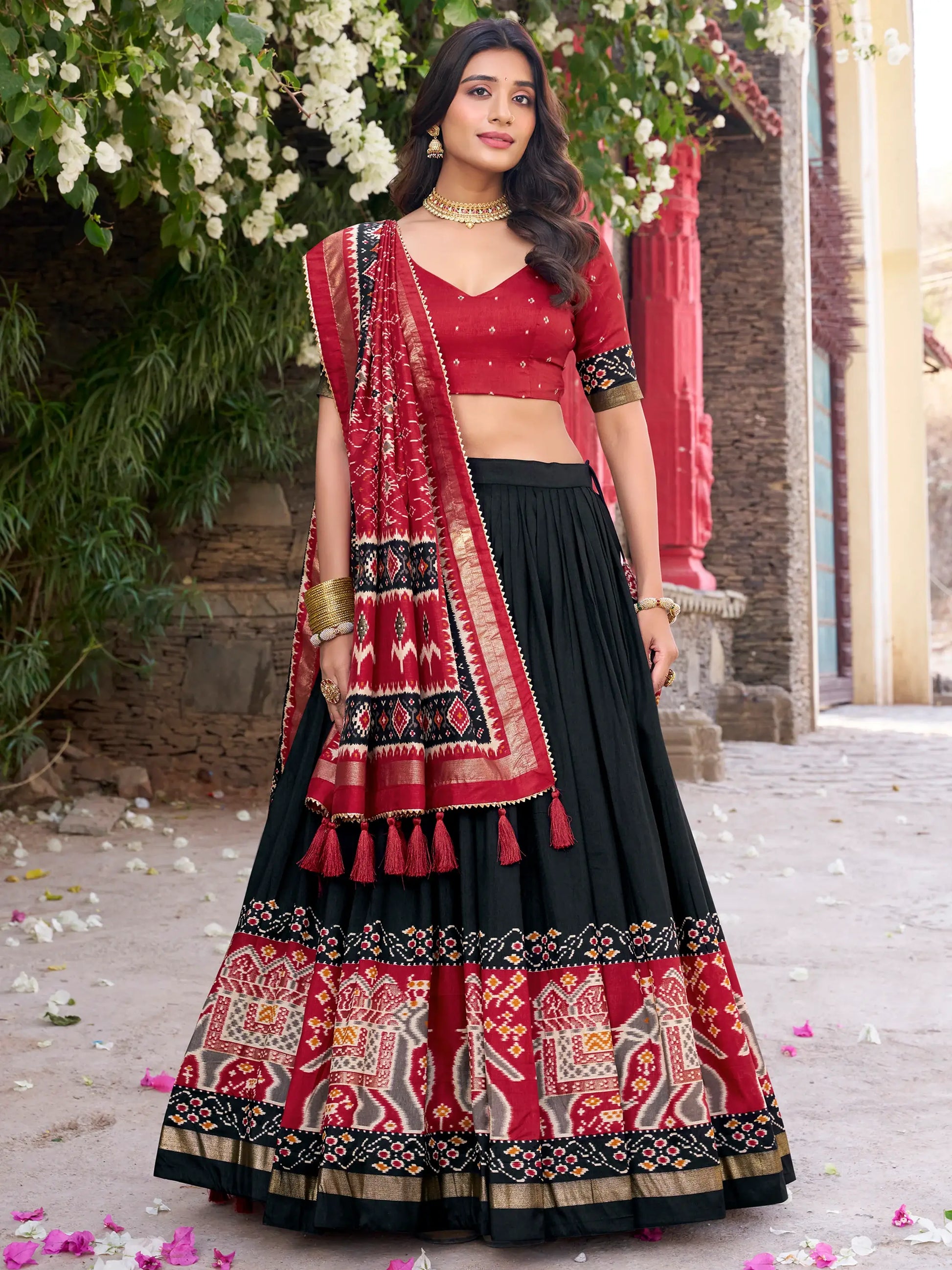Fascinating Black Patola Printed Tussar Silk Lehenga Choli With Dupatta - Zeel Clothing