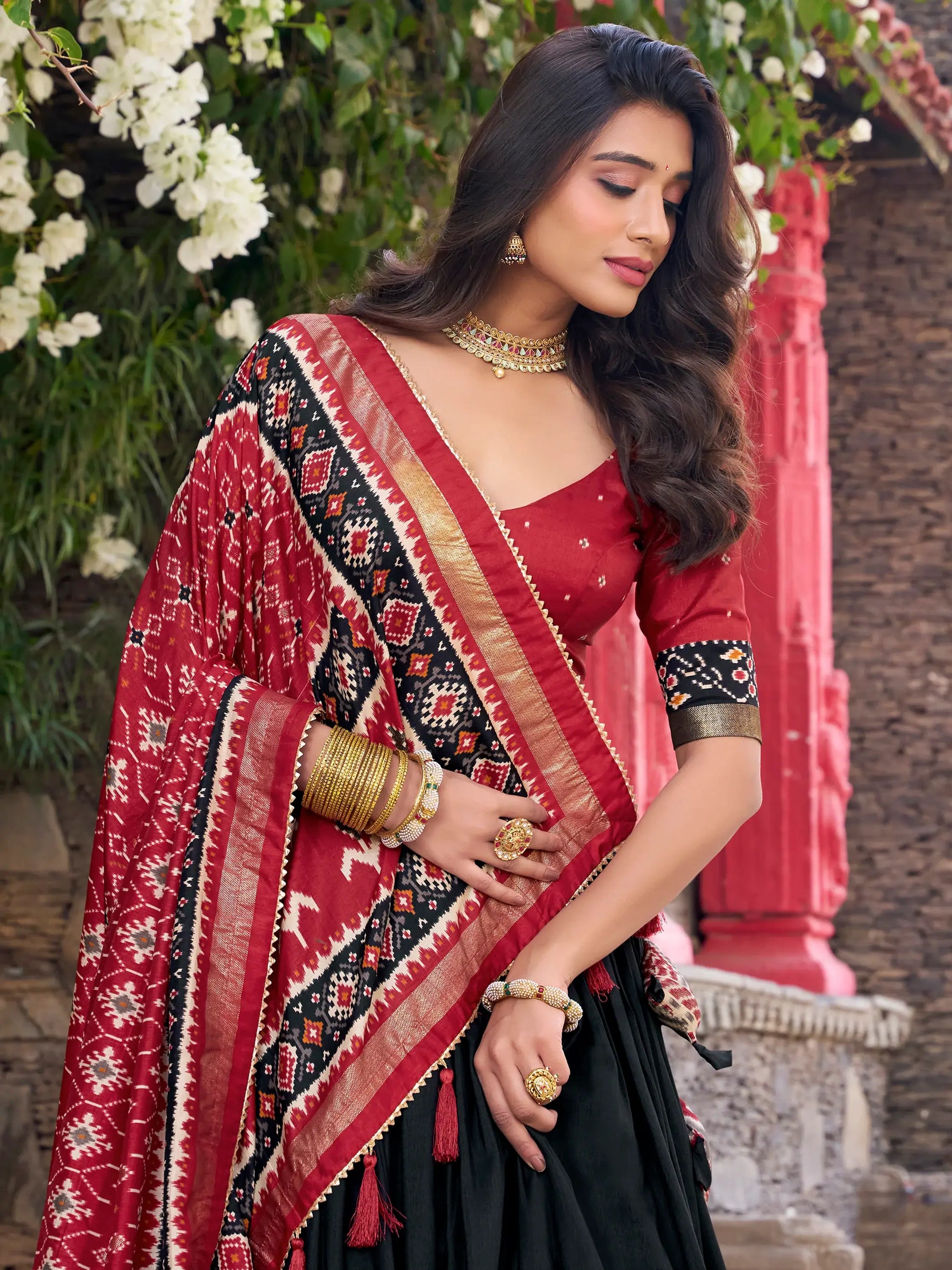 Fascinating Black Patola Printed Tussar Silk Lehenga Choli With Dupatta - Zeel Clothing