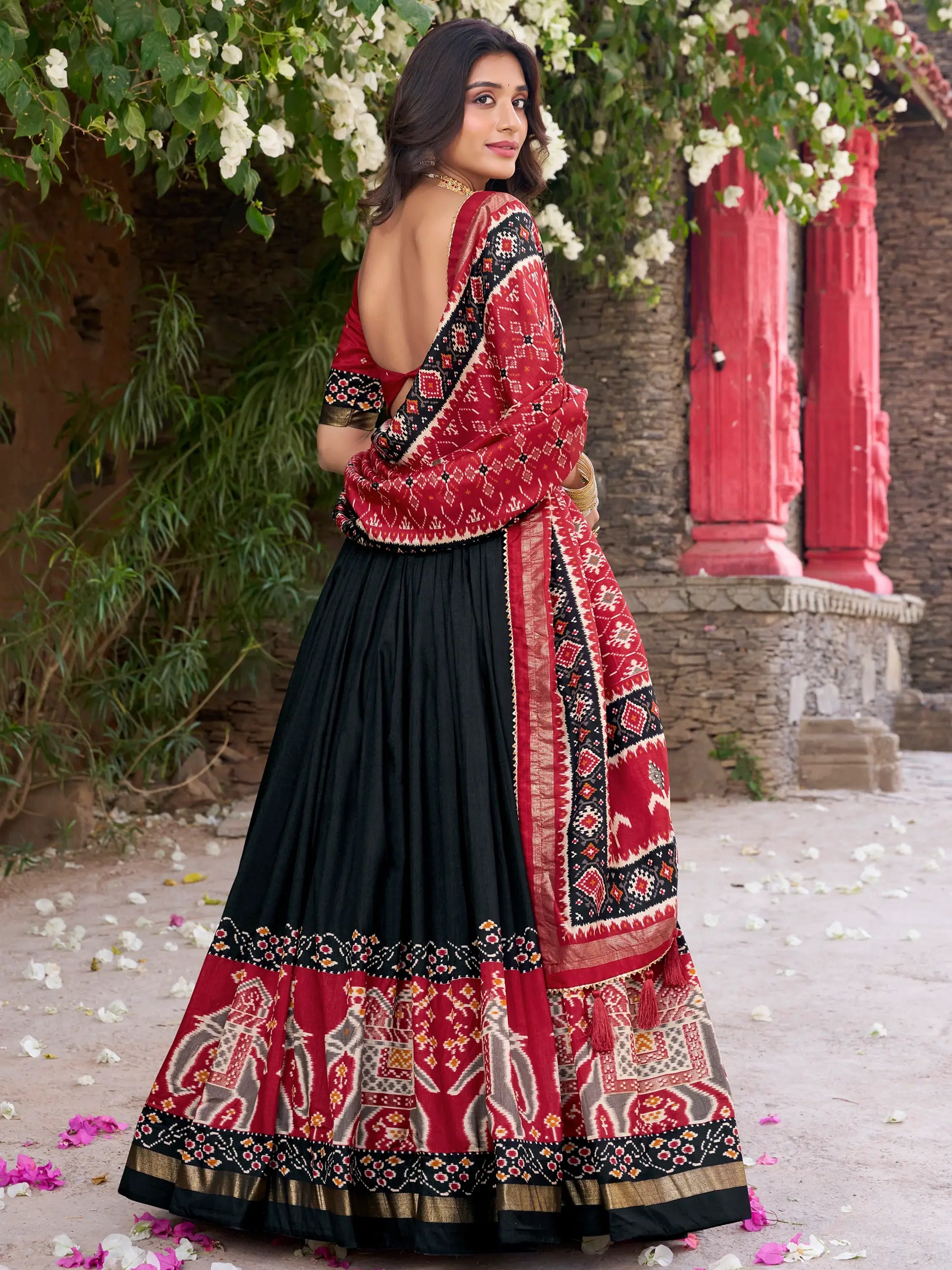 Fascinating Black Patola Printed Tussar Silk Lehenga Choli With Dupatta - Zeel Clothing