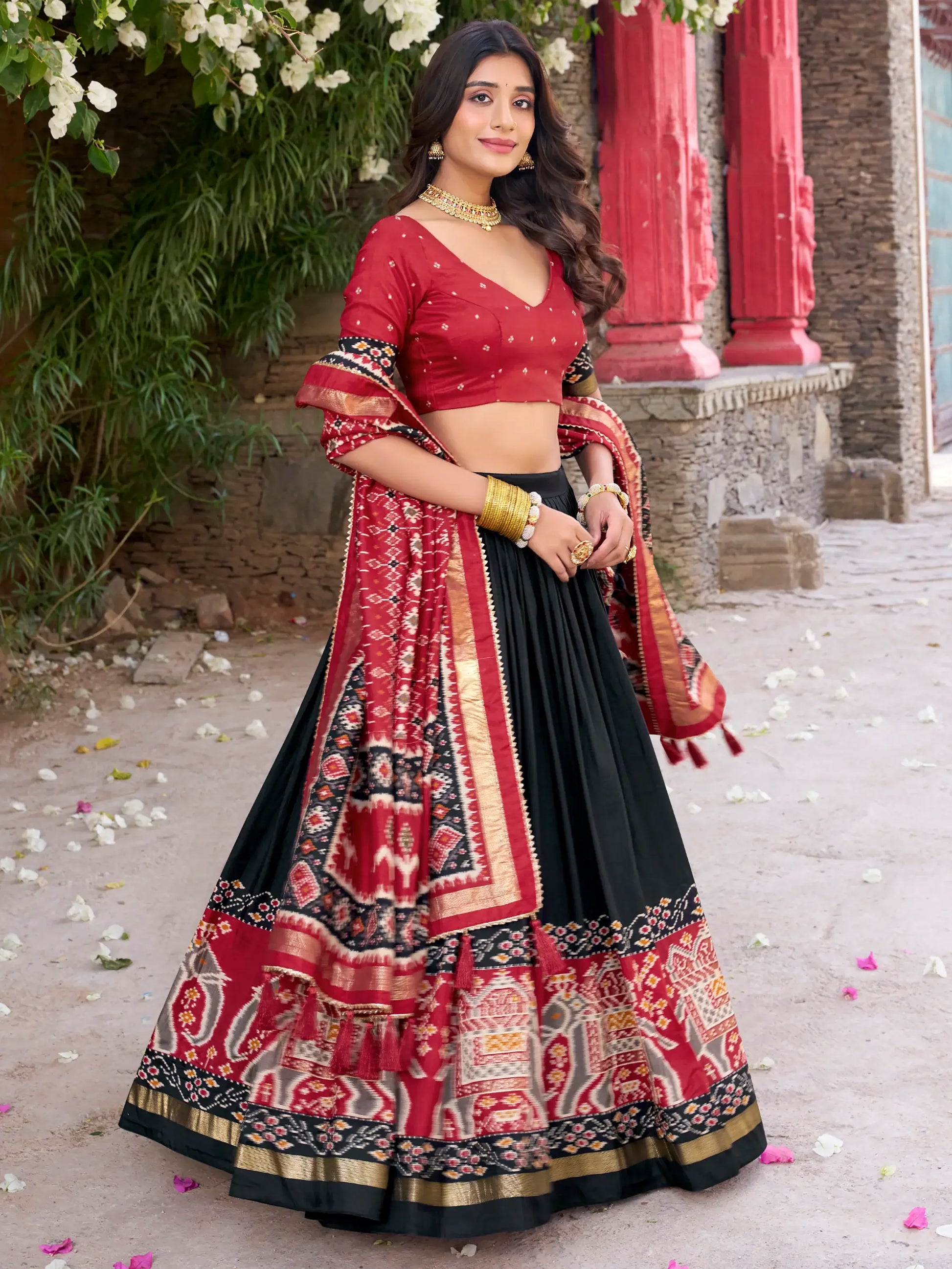 Fascinating Black Patola Printed Tussar Silk Lehenga Choli With Dupatta - Zeel Clothing