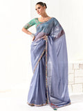 Fascinating Dusty Blue Border Work Tissue Silk Party Wear Saree - Zeel Clothing