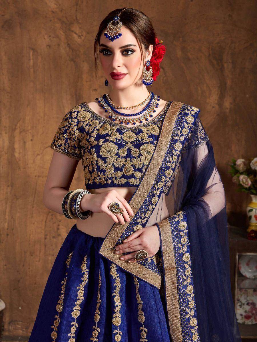Fascinating Navy Blue Embroidered Raw Silk Lehenga Choli - Zeel Clothing