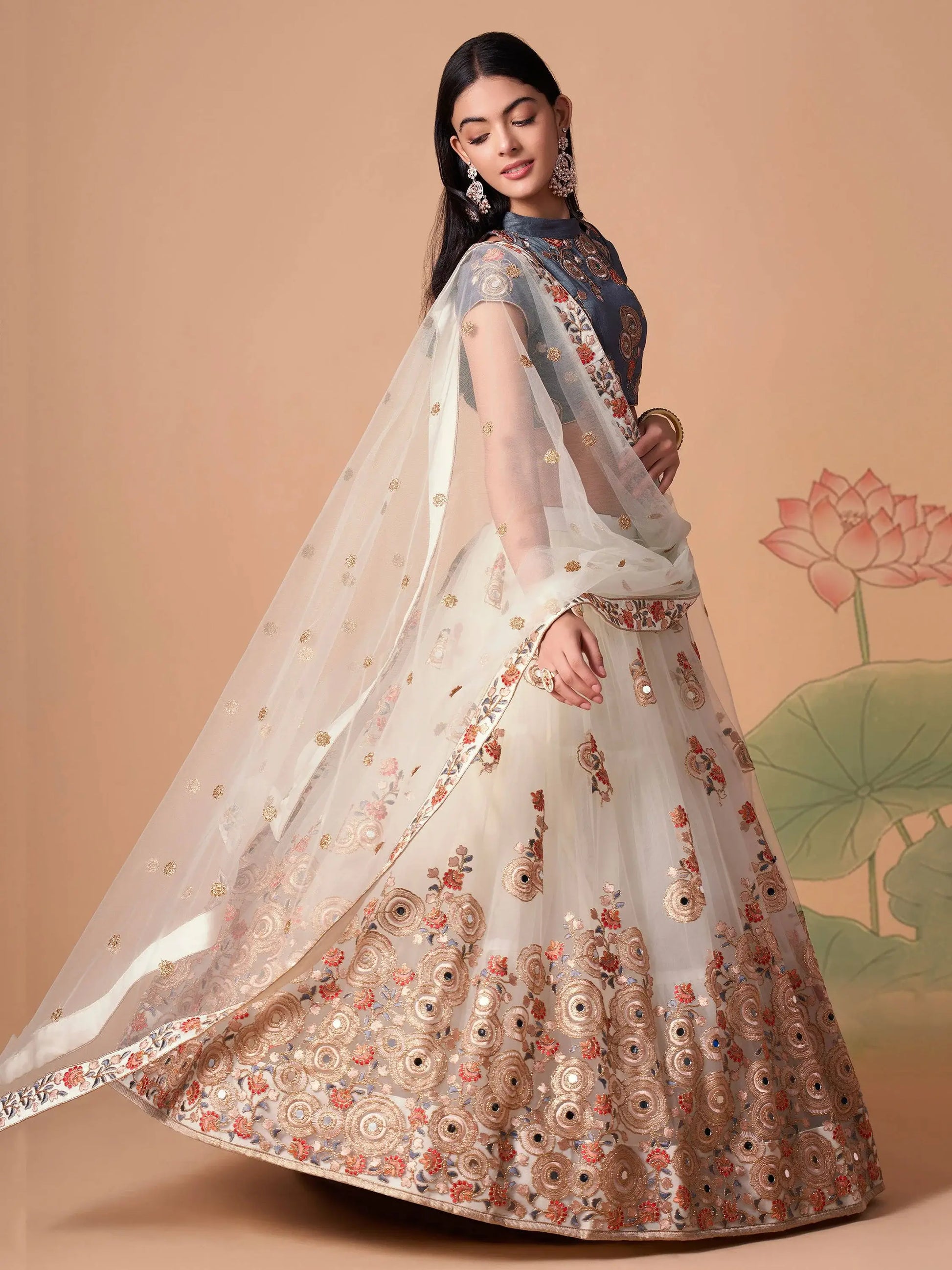 Fascinating Off-White Mirror Work Net Party Wear Lehenga Choli - Zeel Clothing
